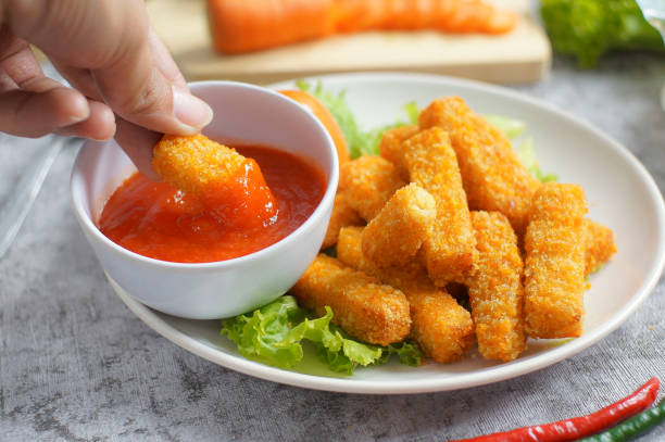 istock Chicken nugget with ketchup 1313028291
