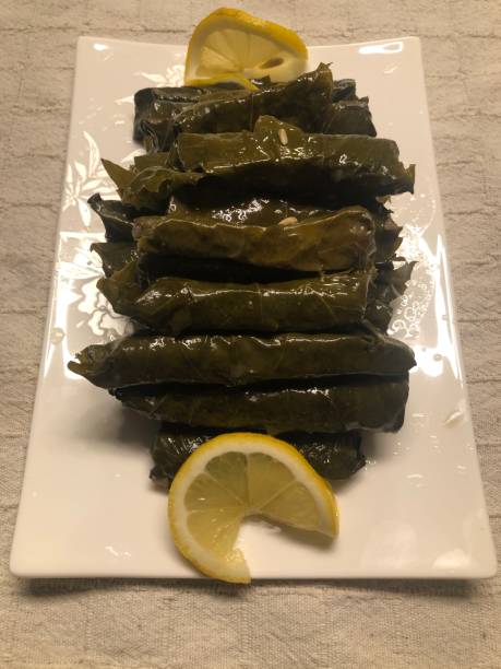 istock Staffed grape leaves with lemon decoration on iftar table 1313029687