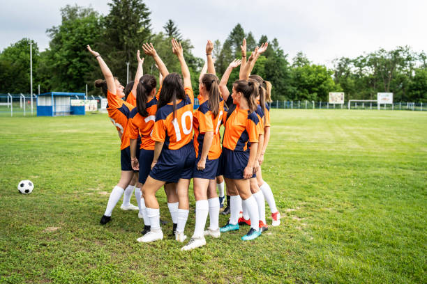 istock Women soccer team greeting together before the game 1313030507