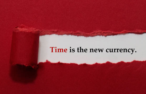istock Time Is The New Currency Written Under Red Torn Paper 1313030595