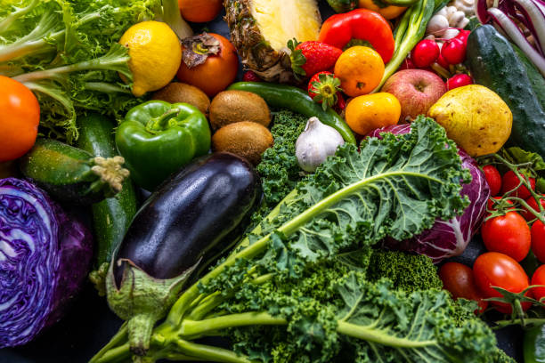 istock High angle view on various fresh fruit and vegetable flat arrangement. 1313030597