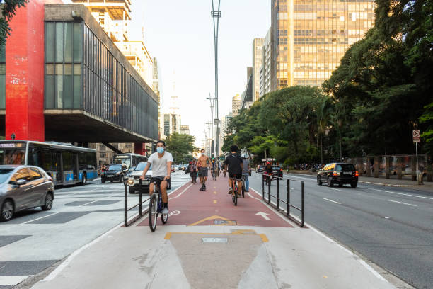 people doing physical activities with face masks on avenida paulista during the quarantine. - group of people art museum clothing lifestyles imagens e fotografias de stock