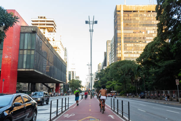 people doing physical activities with face masks on avenida paulista during the quarantine. - group of people art museum clothing lifestyles imagens e fotografias de stock