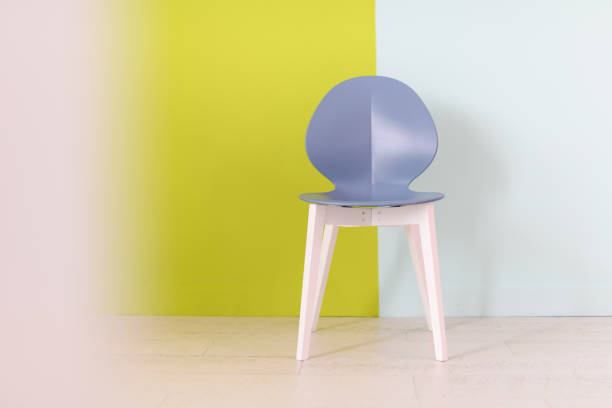 istock modern blue chair in front of a blue green background 1313044349