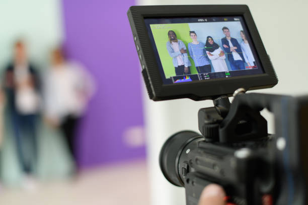istock cameraman with professional equipment shoots video clips 1313050098