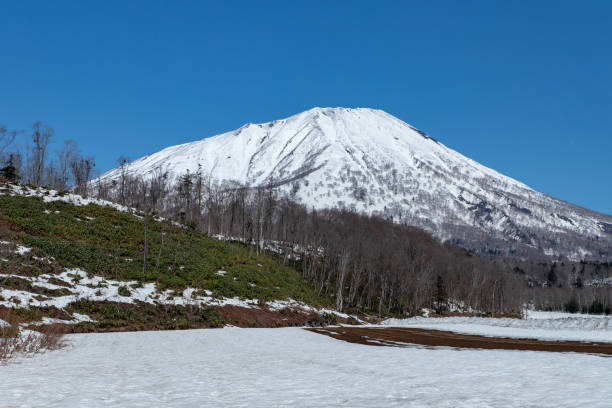 istock Mountain scenery in early spring in Hokkaido. 1313051813