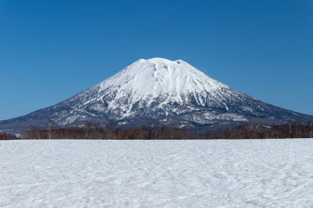 Mountain scenery in early spring in Hokkaido stock photo