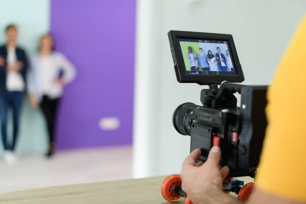 istock cameraman with professional equipment shoots video clips 1313052514