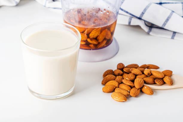 istock Step by step recipe. Cooking nuts vegetable milk. Step 3 cooked  almonds milk in glass. Homemade food concept. Plant based organic veggie milk, lactose free 1313060402
