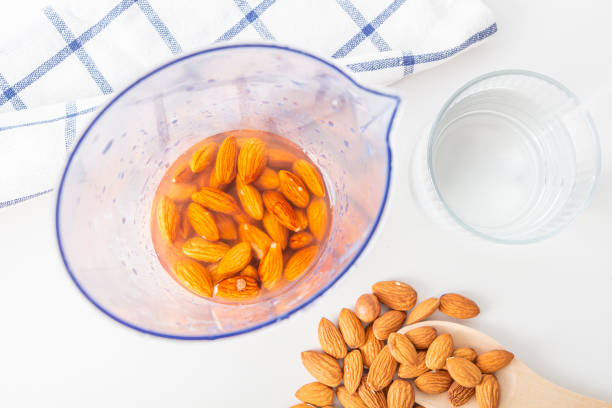 istock Step by step recipe. Cooking nuts vegetable milk. Step 2pour water to almonds in blender. Homemade food concept. Plant based organic veggie milk, lactose free 1313060407