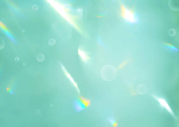 Holographic foil paper close-up. Modern trendy colourful iridescent background