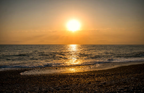 istock Beautiful sunset by the sea 1313066994
