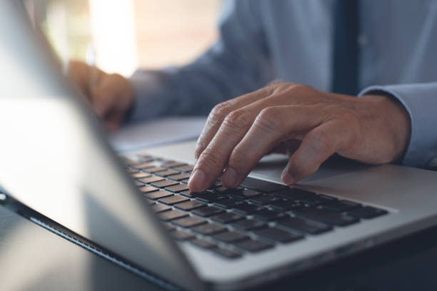istock Businessman working on laptop in office 1313069991