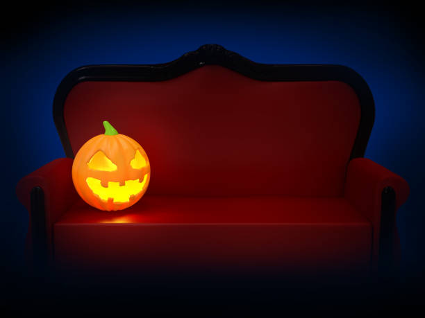 istock sofa with pumpkin halloween night 1313072867