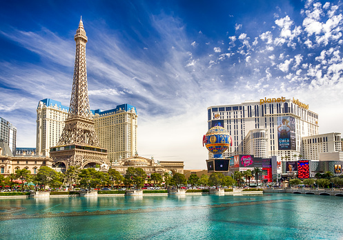 Las Vegas,  Nevada, United States - September 27, 2023: Hotel, replica of the Eiffel Tower, and air balloon of the Paris Paris hotel and casino at the Las Vegas Strip