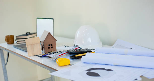 istock Architects are working to design the construction layout and blueprint. 1313079917