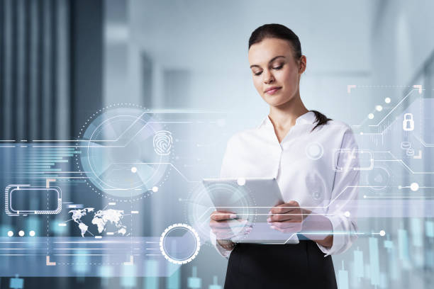 istock Businesswoman with tablet in hands, data information digital hud 1313079961