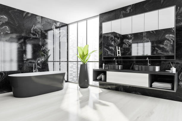 istock Bathroom interior. Minimalist bathtub on white floor with plant and sinks 1313080748