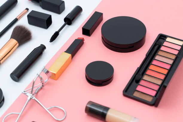 istock set decorative cosmetics on pink and white 1313080884