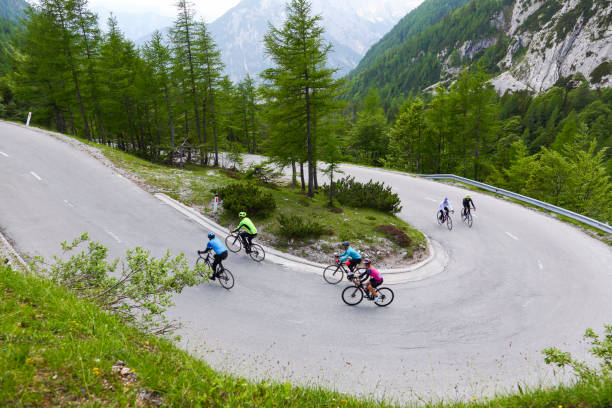 istock Group of cyclists on a hairpin curve 1313082008