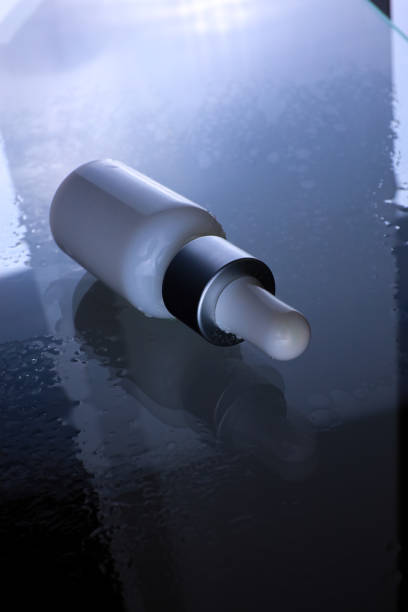 istock white cosmetic bottle with pipette 1313084263