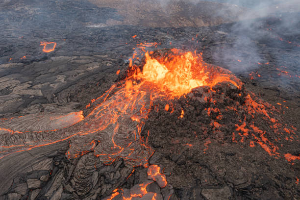 istock lava eruption volcano aerial view, Iceland 1313085479