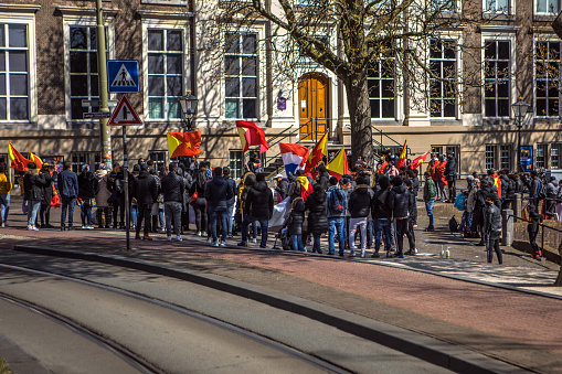 Den Haag, Netherlands - April 14th, 2021: Dutch people protesting the alleged Tigray genocide in Ethiopia outside the Binnenhof during the Corona Virus lockdown in the Spring of 2021 in the centre of Den Haag, the Netherlands.