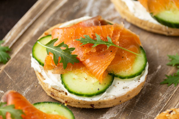 istock Fresh bagel with Salmon, cream cheese and cucumber 1313085925