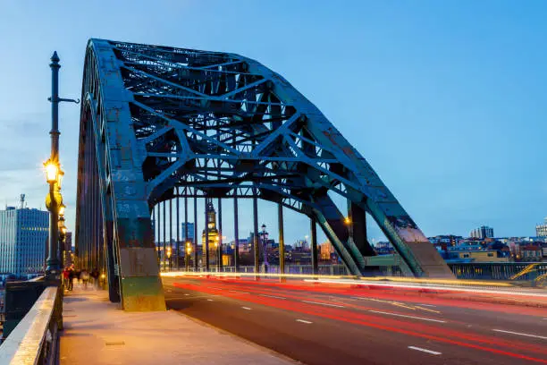 Photo of Tyne Bridge in Newcastle, a long exposure with blurred traffic during rush hour and blue hour