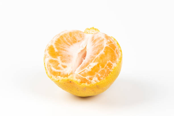 istock peeled and whole tangerines isolated on white background 1313087801