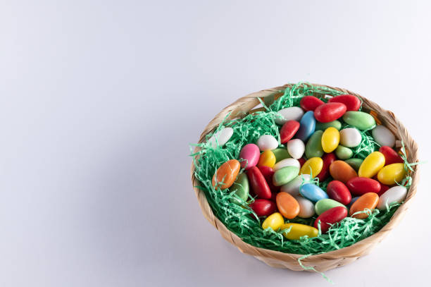 istock Easter basket with colorful sweet eggs 1313089238