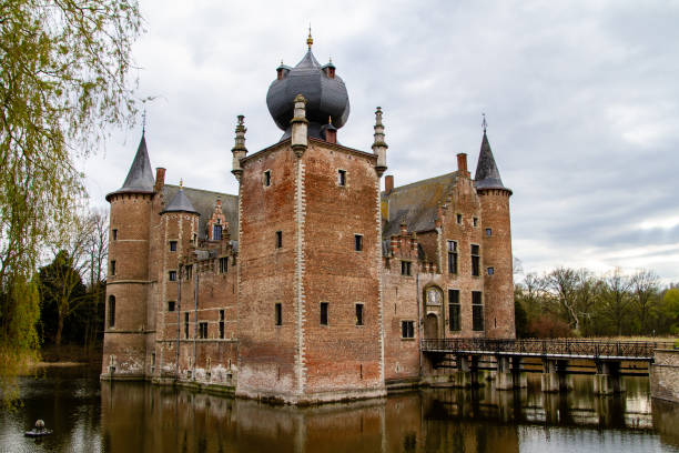 Aartselaar, Belgium, April 16, 2021. Cleydael Castle was originally a medieval feudal moated castle. Private property, it belonged to a golf course.
