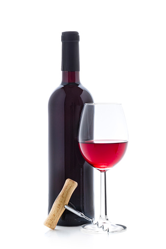 Front view of a glass full of red wine, a wooden handle screw cap and a wine bottle isolated on white background. Studio shot taken with Canon EOS 6D Mark II and Canon EF 100 mm f/ 2.8