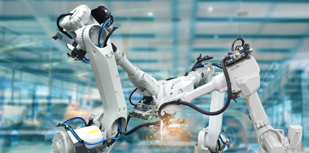 istock Technology of industrial production with automatic robots and mechanical arms 1313092235