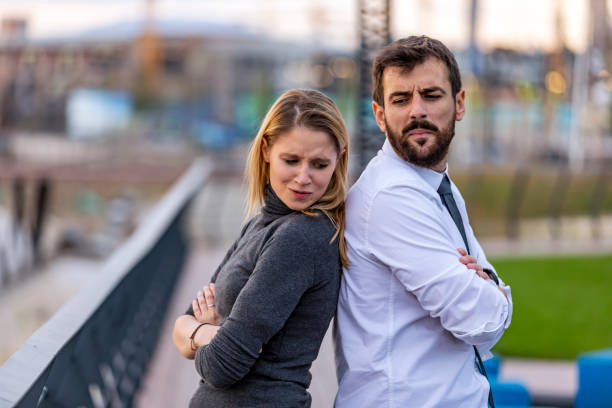 istock Handsome Man is Arguing with his Girlfriend Near the River 1313095969