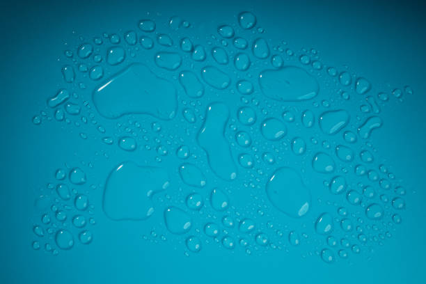 istock Water Drops on Blue Background. World Water Day Concept. Droplet Texture Surface. Environment Care. CSR, Corporate Social Responsibility or CSC, Corporate Social Contribution 1313097076