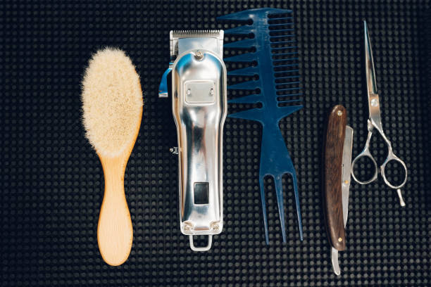 istock Barber tools lying on the table at barber shop. 1313097973