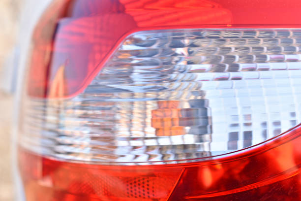 istock Red and white shiny car lights close up 1313099285
