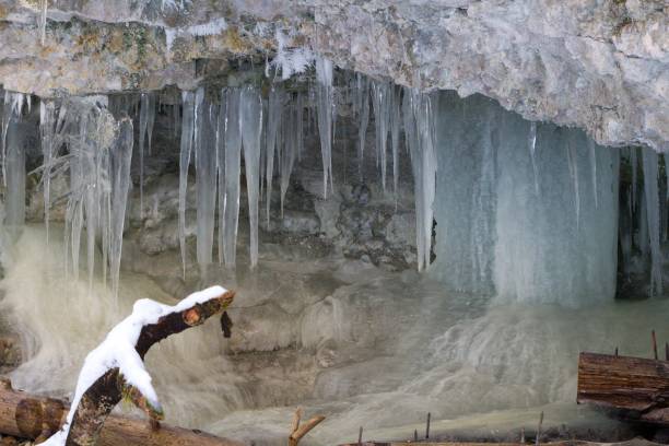 istock Ice stalactites in cave in winter 1313103522