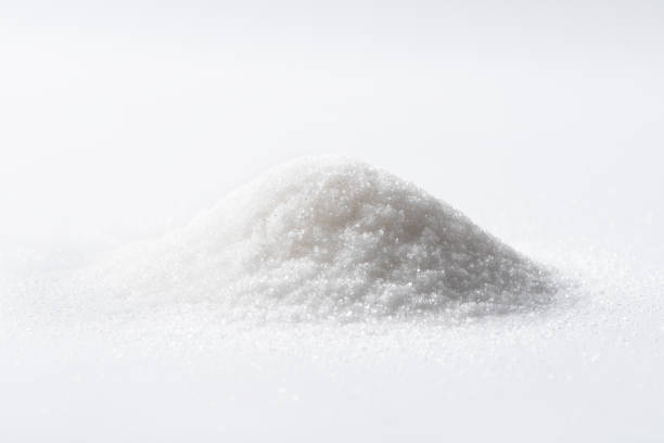 istock heap of sugar isolated on white background with clipping path 1313104492