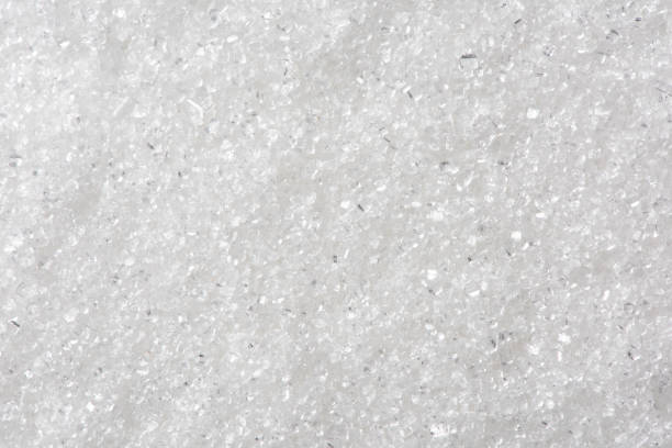 istock Close up of white sugar background. 1313104561