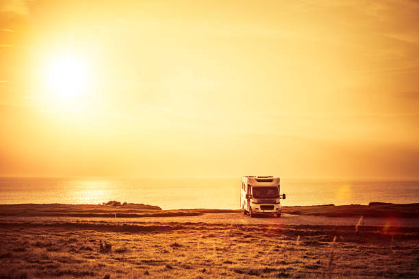 istock Motorhome on a sandy beach by the sea 1313108929