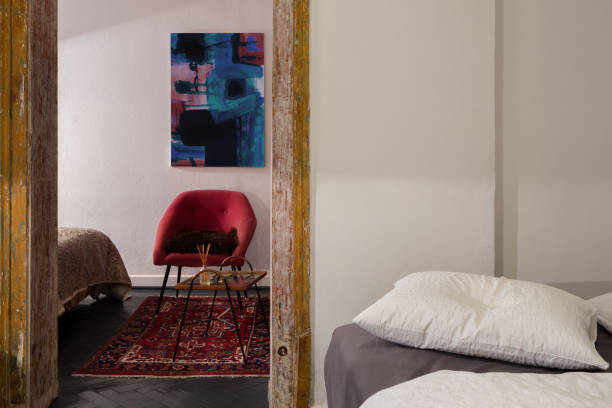 istock Vintage chair in bedroom 1313109012