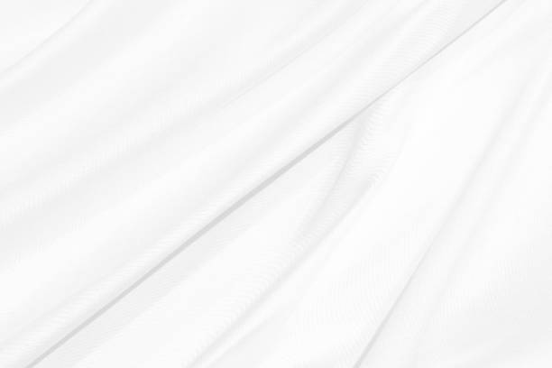 istock Clean smooth curve woven beautiful soft fabric abstract shape decorative fashion textile silver white background 1313109235