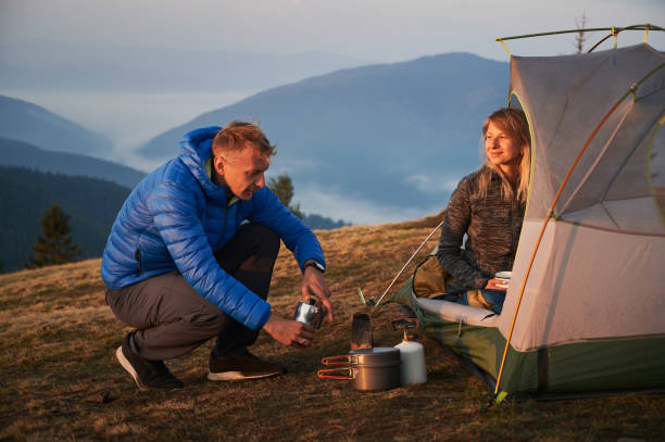istock Camping in mountain hills at early autumn. 1313110299