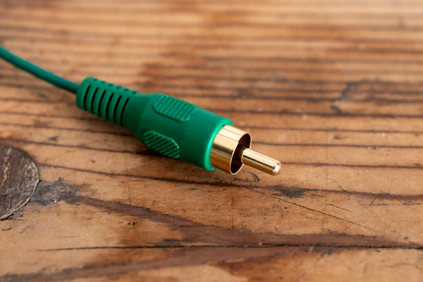 istock audio-video analog cable on an old wood table background 1313111539