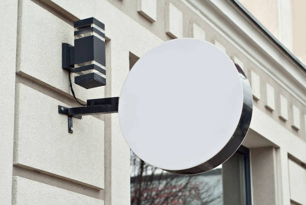 istock Round sign on the building. Copy space and space for text. Mockup for design. Blank template for advertising. 1313112521