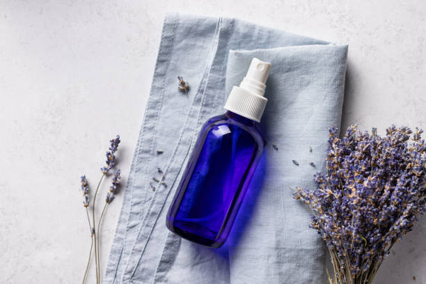 istock transparent glass bottle with lavender spray 1313112996