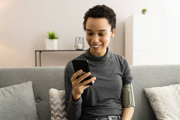istock Blood Pressure Check Using Smart Monitor 1313113049