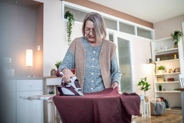 770+ Old Woman Ironing Stock Photos, Pictures & Royalty-Free Images ...
